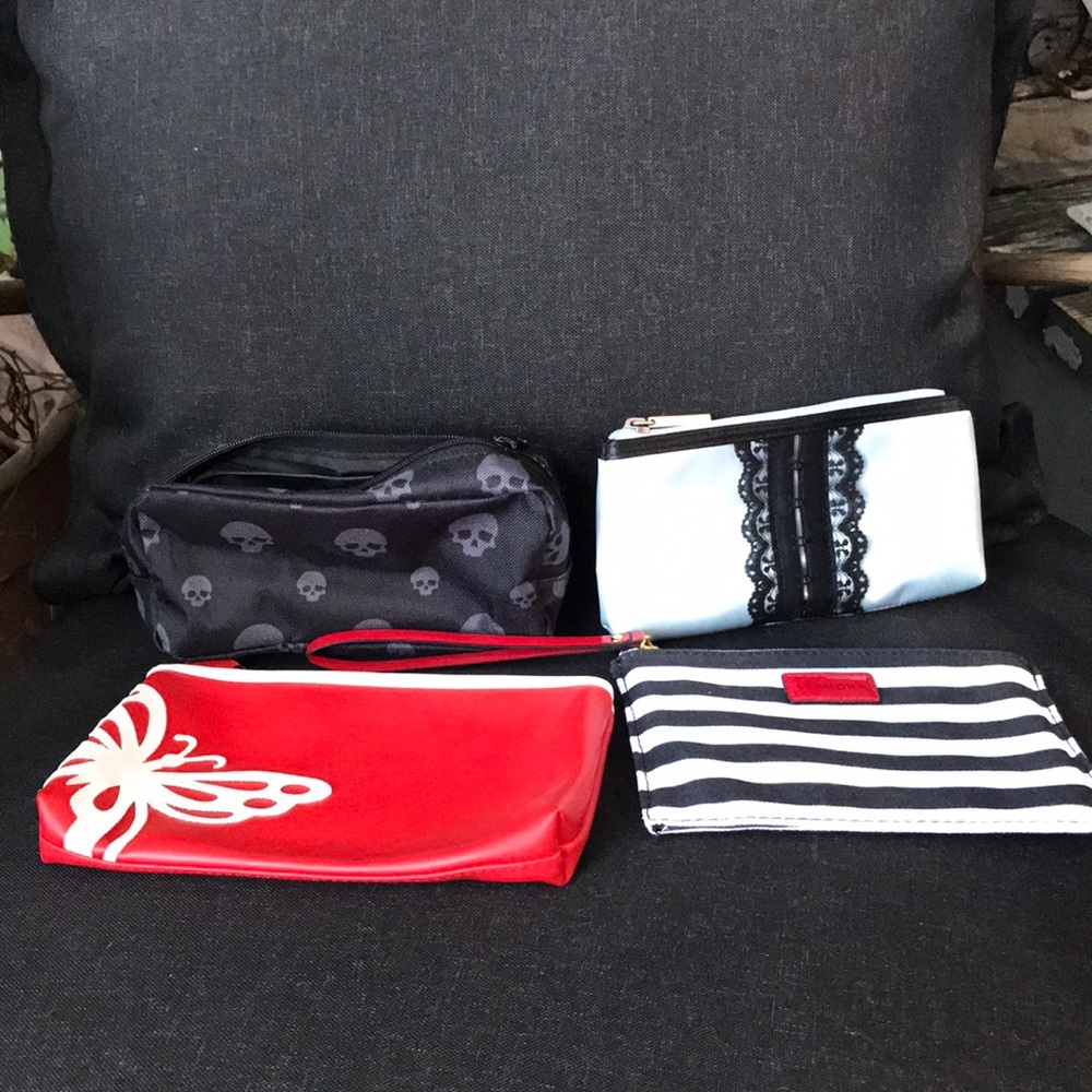 Lot of 4 miscellaneous nonspecific branded cosmetic/ makeup bags